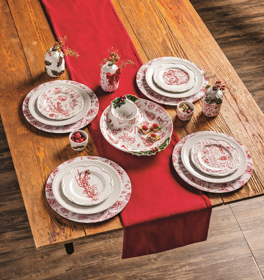 Red and white holiday chip and dip platter on a table setting
