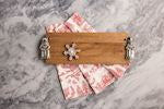 Wooden rectangle charcuterie board, with silver Santa handles