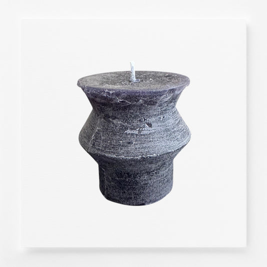 Textured grayish black textured candle