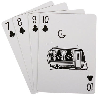 Set of playing cards with a camper illustration on one card, on a white background