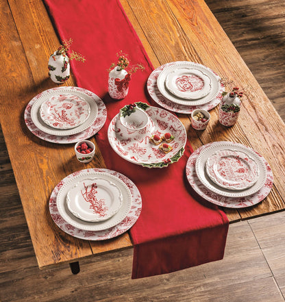 Red and white holiday chip and dip platter on a table setting