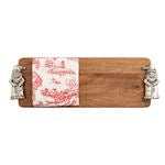 Wooden tray with a decorative red and white patterned napkins, silver Santa handles