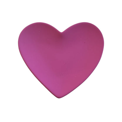 Bright pink heart-shaped small plate.