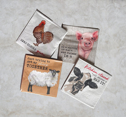 Set of four decorative napkins with farm animal illustrations 