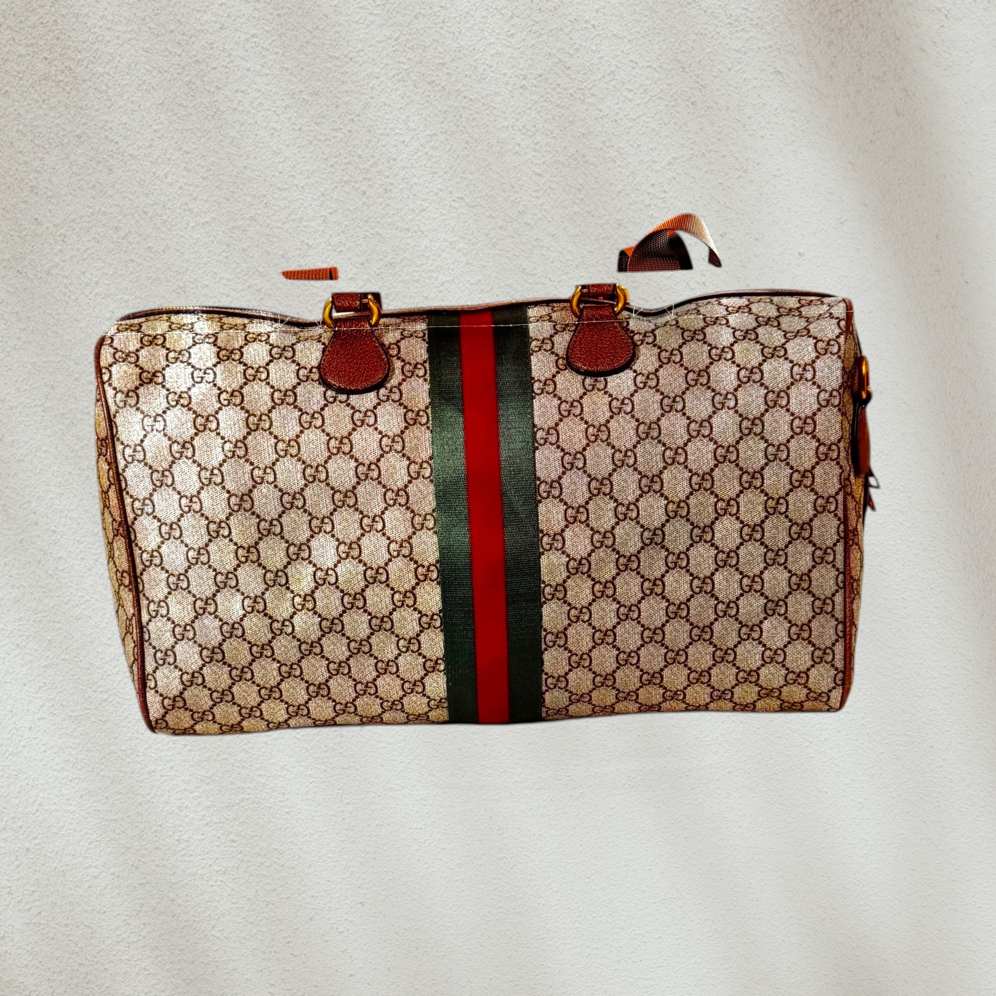 Designer looking tote with canvas handles with Gucci pattern