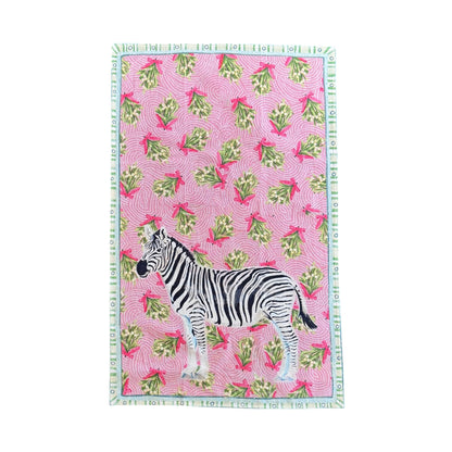 Towel with zebra design: pink and green patterned background