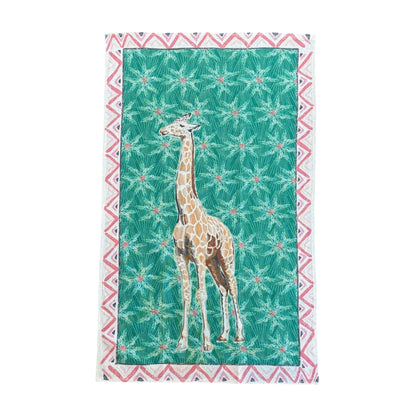 Giraffe illustration on a green patterned decorative towel