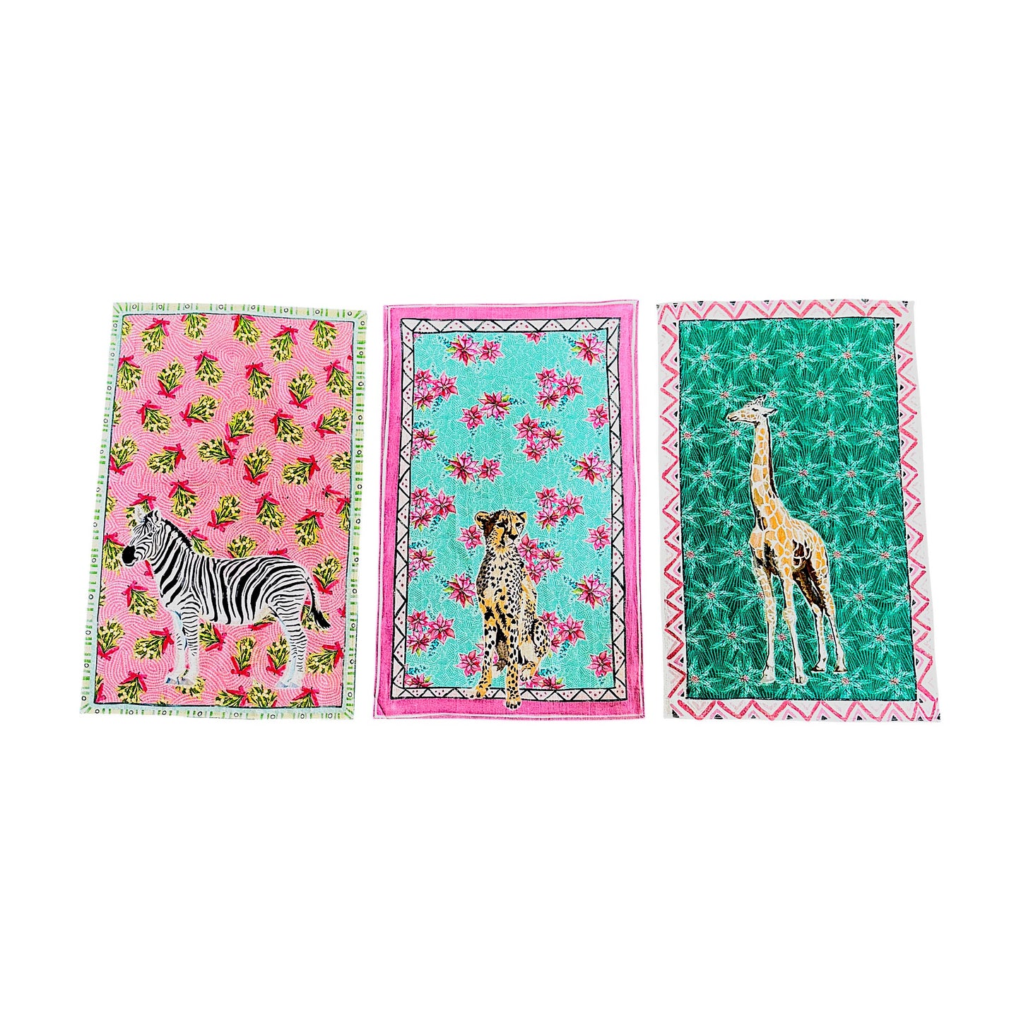 Three fabric towels with animal prints on a white background