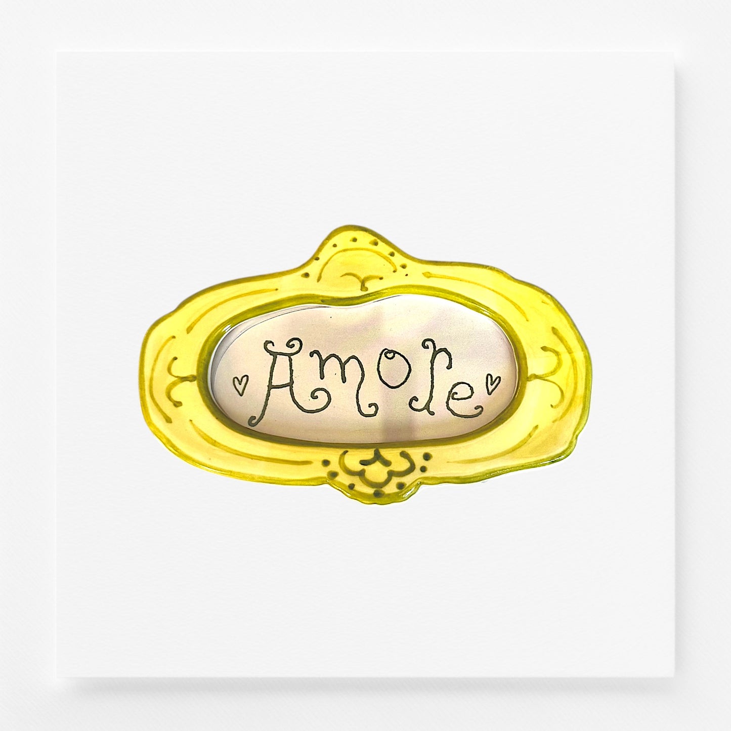 Decorative frame magnet with 'Amore' text 