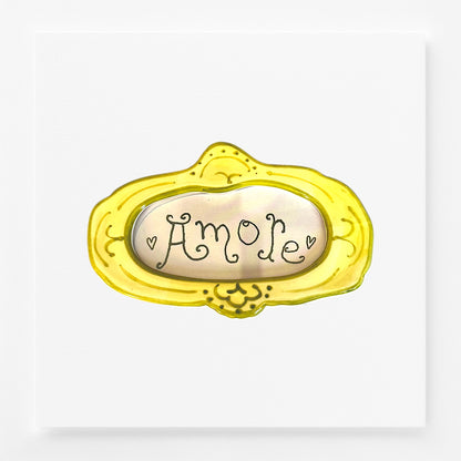 Decorative frame magnet with 'Amore' text 