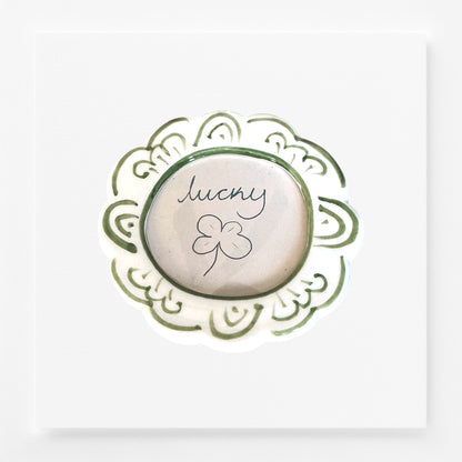 Decorative frame magnet with 'lucky' and a clover leaf design