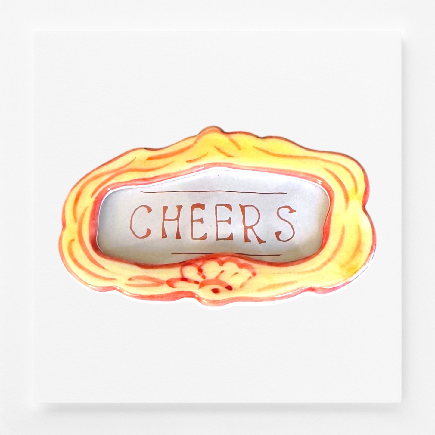 Decorative frame magnet with 'CHEERS' text 
