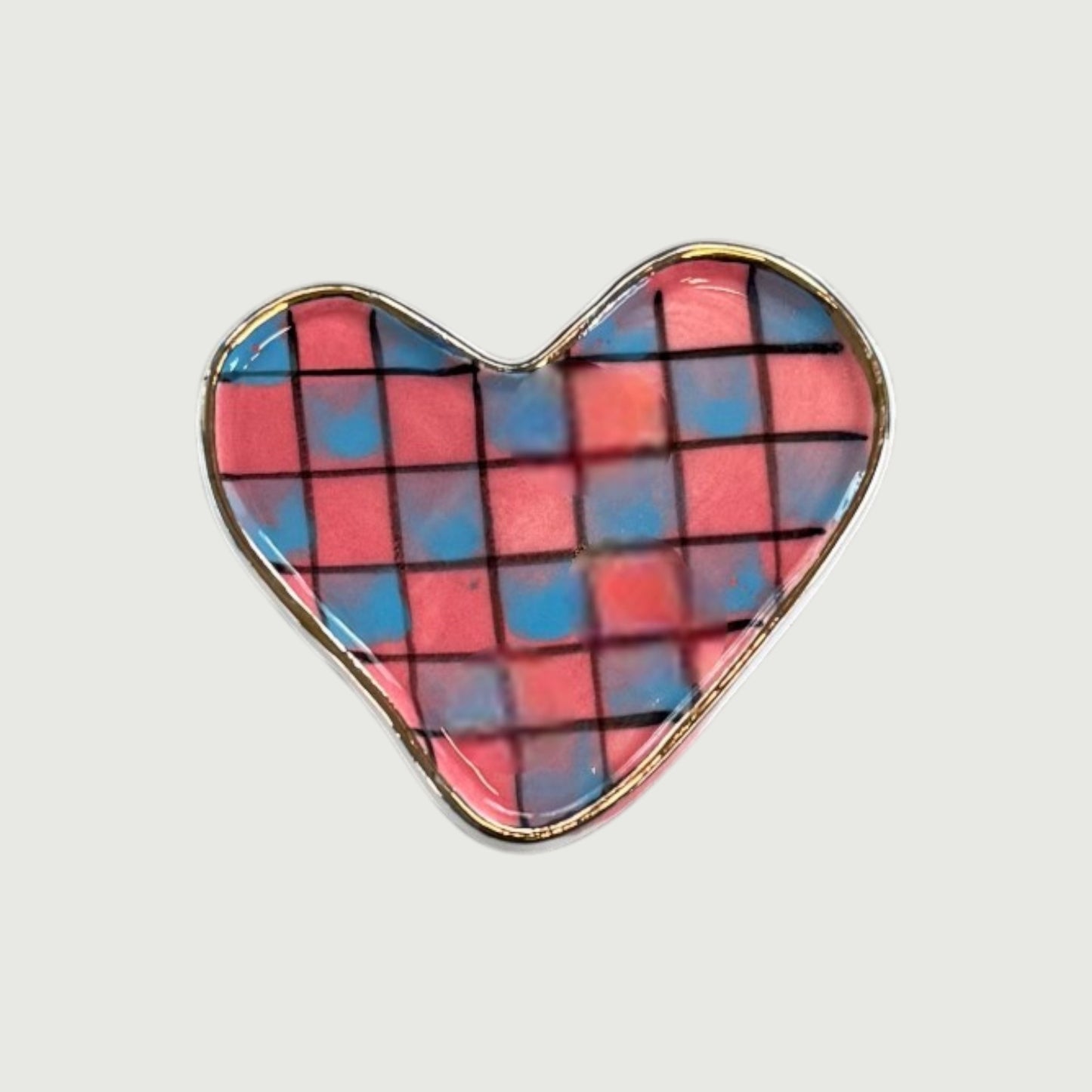 Heart-shaped magnet with red and blue pattern