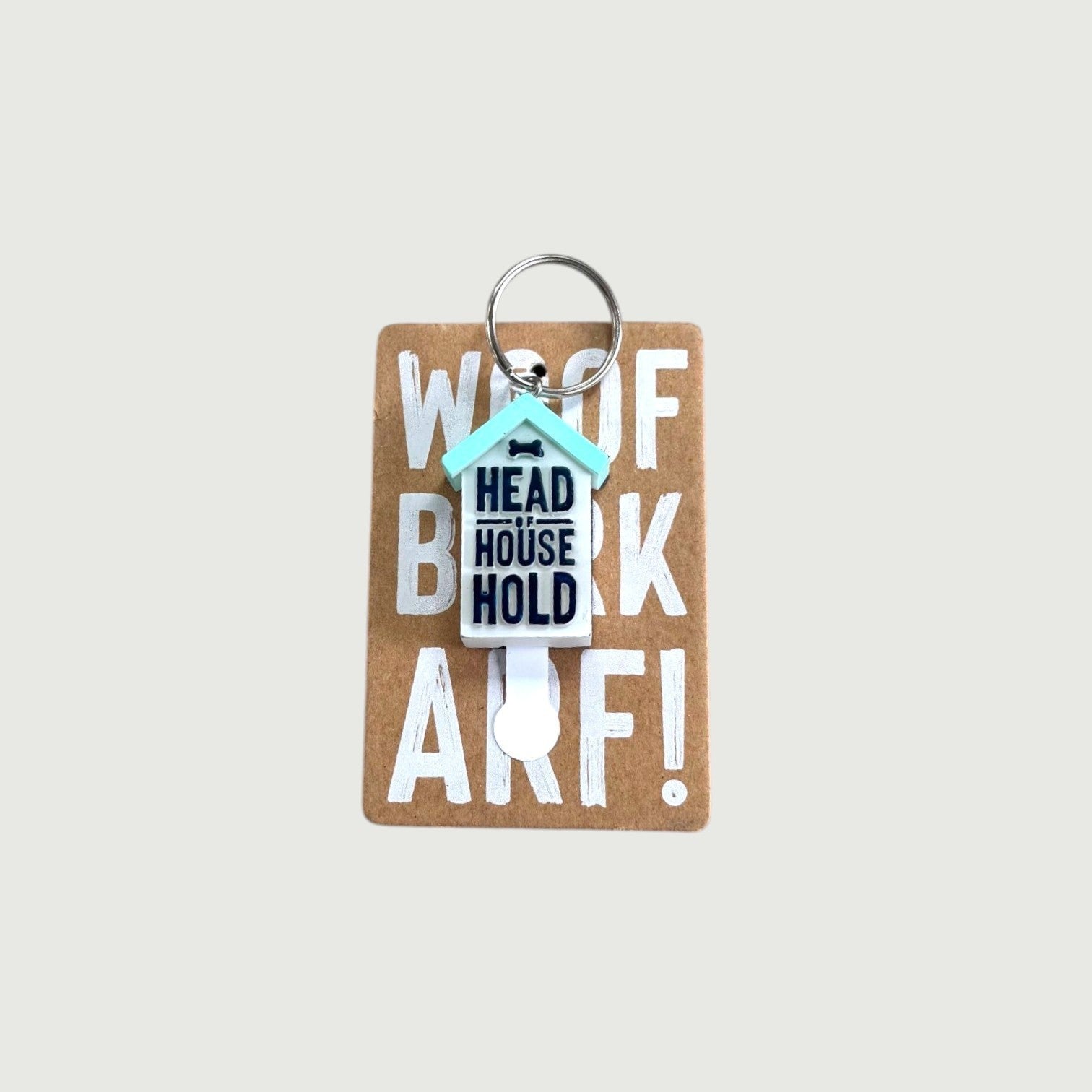 Keychain with text 'Woof, Head House Hold