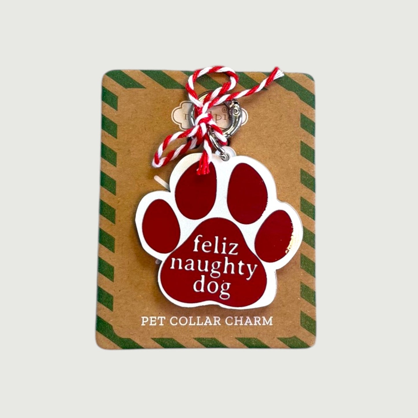 Pet collar charm with red paw print and 'feliz naughty dog' text.