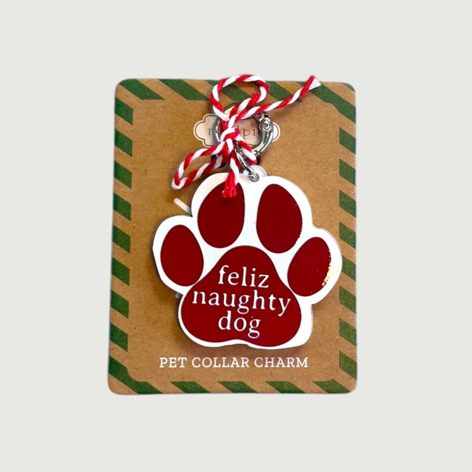 Pet collar charm with red paw print and 'feliz naughty dog' text.