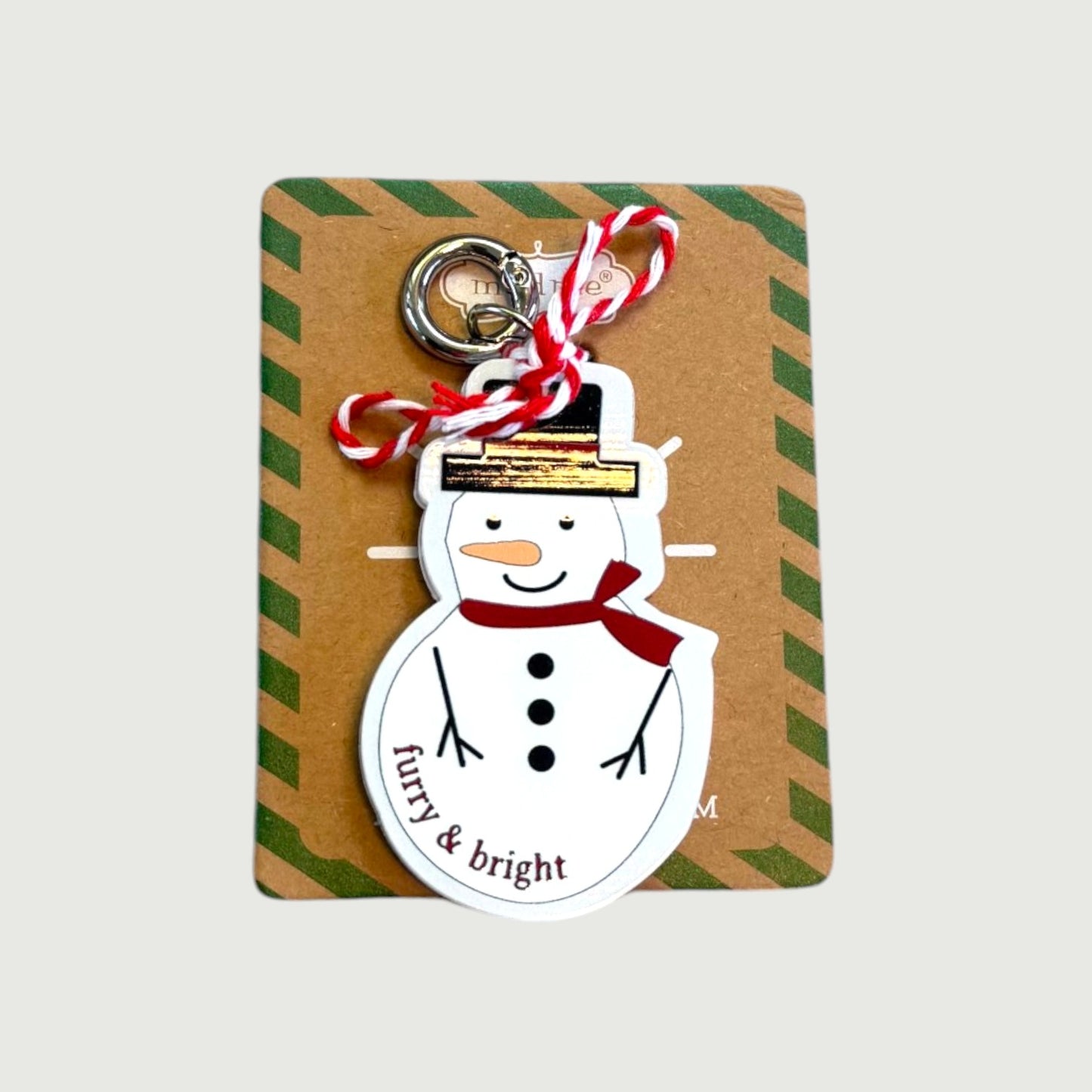 Snowman keychain or bag tag with 'furry & bright' text