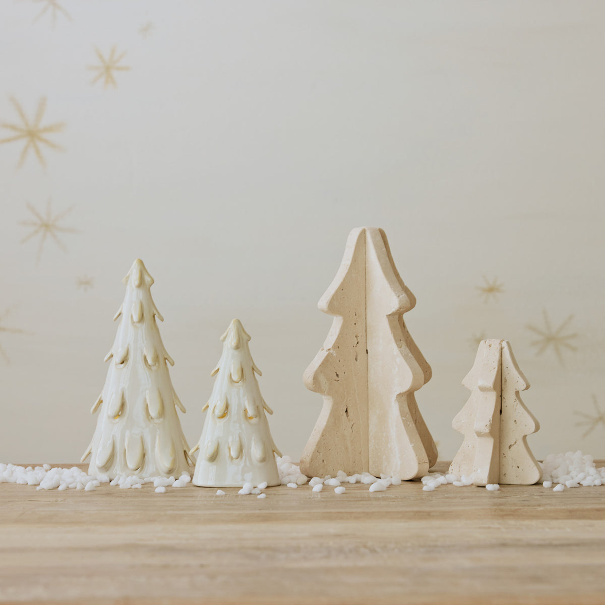 4 holiday white trees in a neutral background