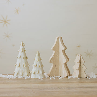 4 holiday white trees in a neutral background