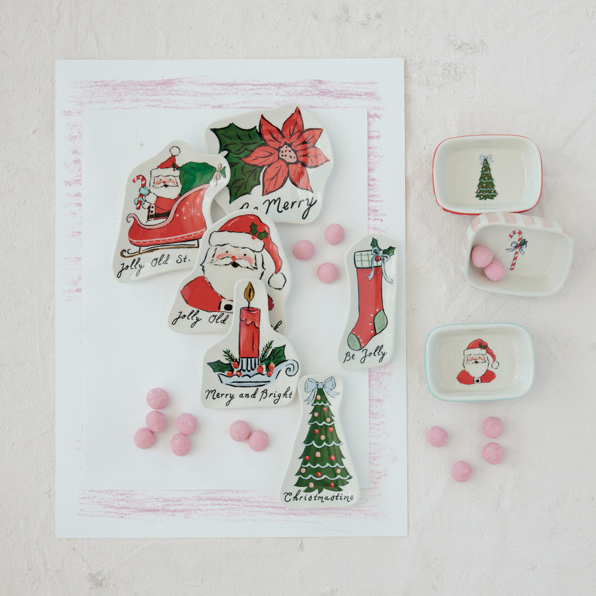 Christmas themed ceramic plates with decorative designs 