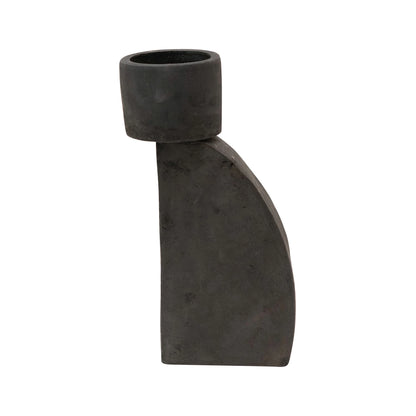 Black concrete candle holder on a white background