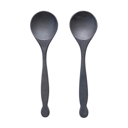 Two black spoons 