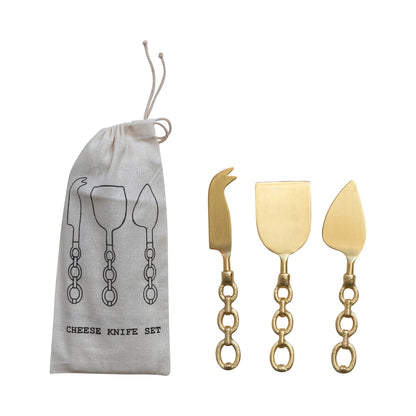 Set of 3 gold cheese knives with linked chain handle in a drawstring bag 