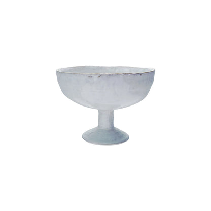 Ceramic footed bowl on a white background