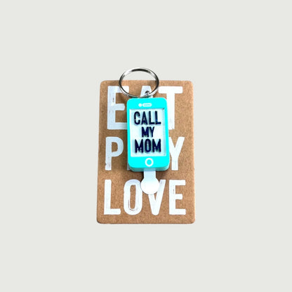 CJ Gift Goddess "Call My Mom" light-up phone-shaped keychain with a blue screen and silver ring.