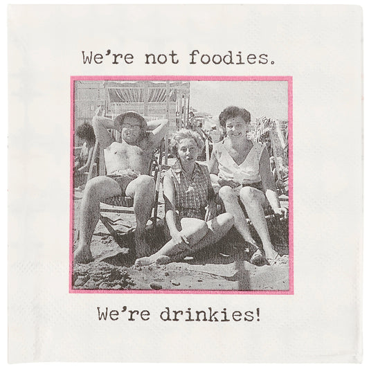 CJ Gift Goddess novelty cocktail napkin featuring a retro black and white beach photo with We're Not Foodies text