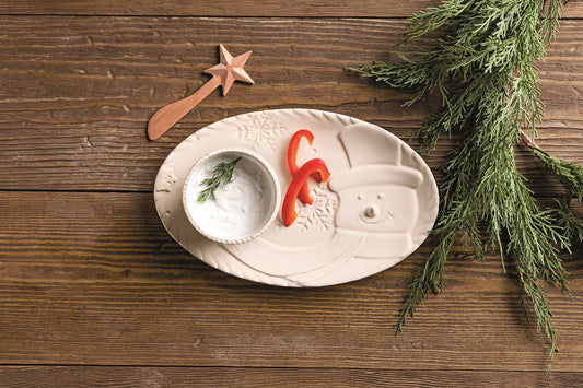CJ Gift Goddess 3-piece stoneware snowman chip and dip set with milk glazed tray, tidbit bowl, and wooden spreader.