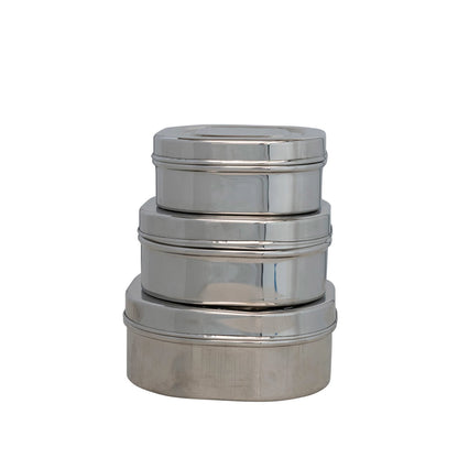 Set of three stacked metal containers
