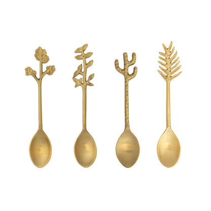 Four gold-colored spoons with decorative handles shaped like plants 
