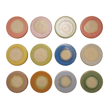 Set of round, multicolored ceramic trivets or coasters
