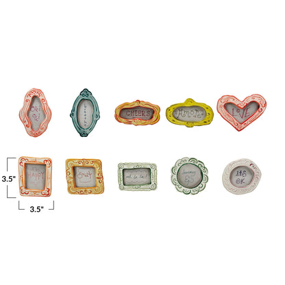 Collection of small decorative picture frames with various designs and text