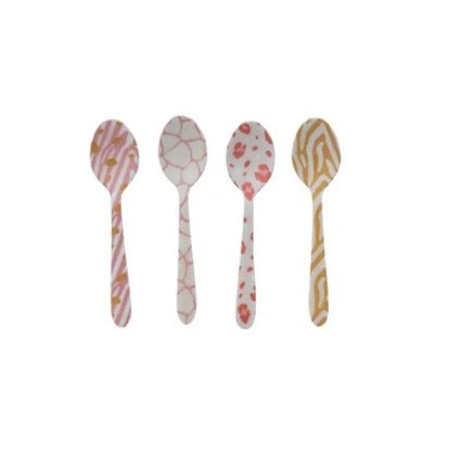 Four animal print patterned spoons in pink and yellow