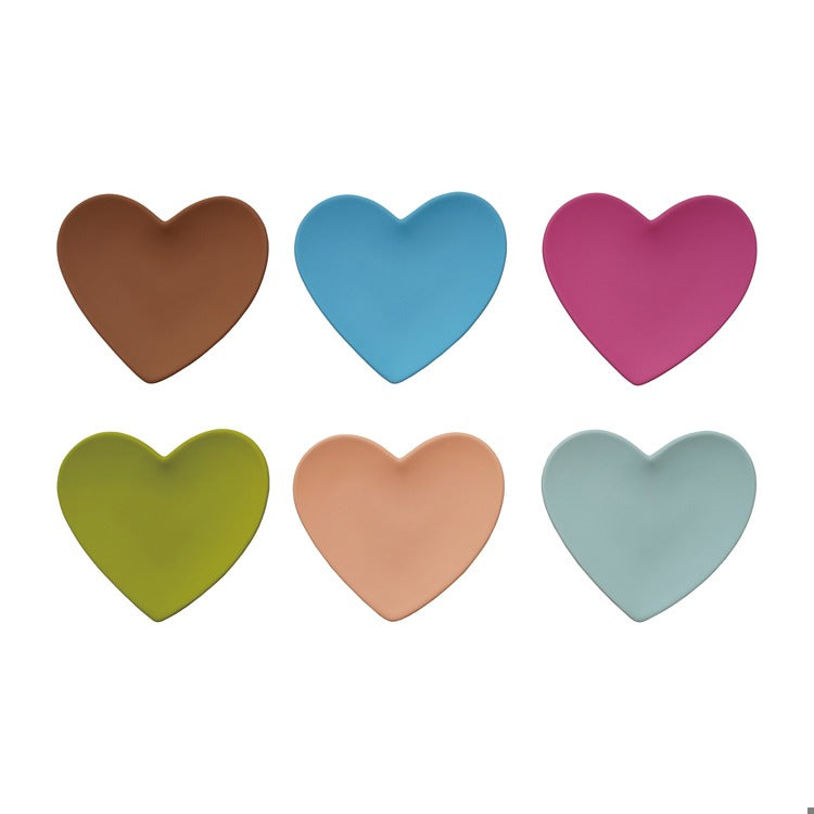 Set of six heart-shaped small plates in bold different colors